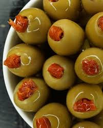 Sun-dried tomato stuffed olives with herbs